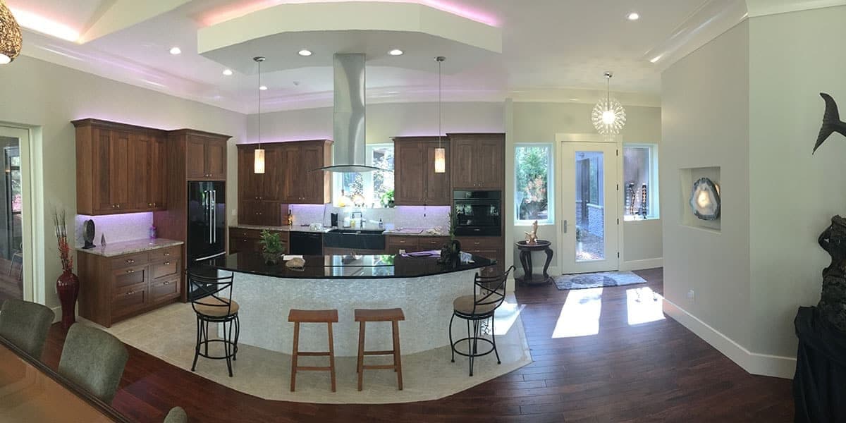 Custom kitchen with island and wooden cabinets in a Blue Ridge Homes build