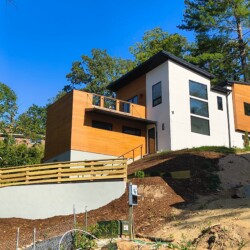Explore this stunning property by Blue Ridge Homes in Woodbine, RD. Modern two-story house with wood accents in Woodbine, RD - Blue Ridge Homes